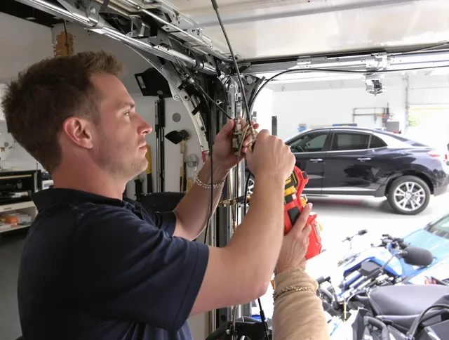 Davidson Garage Door Repair safety certified technician performing cable replacement in Davidson
