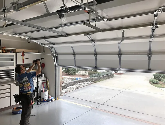 Garage door track repair service by Davidson Garage Door Repair in Davidson